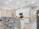 Well-equipped kitchen featuring white cabinets and granite at 249 Rotonda Cir, Rotonda West, FL 33947