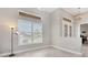 Bright dining room with window and plantation shutters at 249 Rotonda Cir, Rotonda West, FL 33947