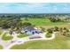 Aerial view of community clubhouse and golf course at 249 Rotonda Cir, Rotonda West, FL 33947