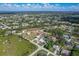 Wide aerial view of house and neighborhood at 7168 Lighthouse St, Englewood, FL 34224
