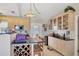 Kitchen with stained glass lighting and wine storage at 7168 Lighthouse St, Englewood, FL 34224