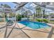 Inviting screened pool with ample deck space for lounging at 7168 Lighthouse St, Englewood, FL 34224