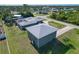 Aerial view of house, detached garage, and expansive lot at 7168 Lighthouse St, Englewood, FL 34224