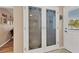 Walk-in pantry with double doors and frosted glass panels at 7168 Lighthouse St, Englewood, FL 34224