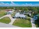 Aerial view of a single-Gathering home with detached garage, pool, and RV parking at 7168 Lighthouse St, Englewood, FL 34224