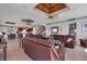 Bright living room with hardwood floors and large windows at 9801 Eagle Preserve Dr, Englewood, FL 34224