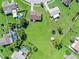 Aerial view showing a large vacant lot in a residential neighborhood at 6367 Facet Ln, Port Charlotte, FL 33981