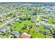 Aerial view of neighborhood, highlighting property location and nearby amenities at 6367 Facet Ln, Port Charlotte, FL 33981