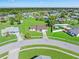 Aerial view of a house with a large backyard in a Gathering-friendly neighborhood at 6367 Facet Ln, Port Charlotte, FL 33981