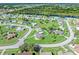 Aerial view showcasing a home's location in a peaceful neighborhood at 6367 Facet Ln, Port Charlotte, FL 33981
