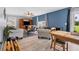 Spacious living room with wood-look flooring and plenty of comfortable seating at 13401 Galveston Ave, Port Charlotte, FL 33981