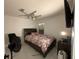 Guest bedroom with a full-size bed and ceiling fan at 324 Comstock St, Port Charlotte, FL 33954