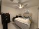 Guest bedroom with full-size bed and ceiling fan at 324 Comstock St, Port Charlotte, FL 33954