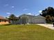 Two-car garage and well maintained lawn at 324 Comstock St, Port Charlotte, FL 33954