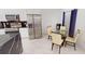Bright kitchen with a breakfast nook and stainless steel appliances at 324 Comstock St, Port Charlotte, FL 33954