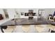 Modern kitchen with a large island and marble countertops at 324 Comstock St, Port Charlotte, FL 33954