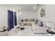 Spacious living room featuring a sectional sofa and stylish decor at 324 Comstock St, Port Charlotte, FL 33954