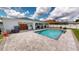 Backyard oasis with a large pool and patio at 324 Comstock St, Port Charlotte, FL 33954