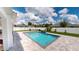Inviting pool with spacious patio and fenced backyard at 324 Comstock St, Port Charlotte, FL 33954