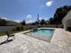 Spacious backyard with a refreshing swimming pool at 324 Comstock St, Port Charlotte, FL 33954