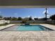 Relaxing rectangular pool with a gray paver deck at 324 Comstock St, Port Charlotte, FL 33954