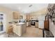 Cozy eat-in kitchen features classic cabinetry and tile flooring, perfect for everyday meals at 6344 Hera St, Englewood, FL 34224