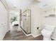 Bathroom with toilet and shower at 6800 Placida Rd # Th2, Englewood, FL 34224