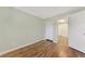 A bedroom with hardwood flooring and a sliding closet door at 797 Michigan Ave, Englewood, FL 34223
