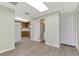 Interior view showing laminate flooring and access to the kitchen and bathroom at 797 Michigan Ave, Englewood, FL 34223