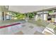 Spacious screened-in patio with tile flooring and backyard views at 797 Michigan Ave, Englewood, FL 34223