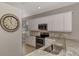 Updated kitchen with stainless steel appliances and granite countertops at 3359 Osprey Ln, Port Charlotte, FL 33953