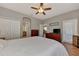 Primary bedroom with walk-in closet and access to bathroom at 3359 Osprey Ln, Port Charlotte, FL 33953