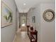 Bright and airy entryway with tile flooring and decorative accents at 3359 Osprey Ln, Port Charlotte, FL 33953