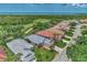 Aerial view of Riverwood community, showcasing homes, golf course, and waterfront at 3359 Osprey Ln, Port Charlotte, FL 33953