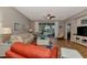 Relaxing living room with hardwood floors, comfortable furniture and pool access at 3359 Osprey Ln, Port Charlotte, FL 33953