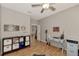 Spacious home office with hardwood floors and view into another room at 3359 Osprey Ln, Port Charlotte, FL 33953