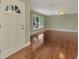 Living room with hardwood floors and large windows at 797 Michigan Ave, Englewood, FL 34223