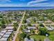 Aerial view of a single-Gathering home with a large backyard and RV parking at 797 Michigan Ave, Englewood, FL 34223