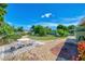 Small patio area with round table and chairs at 797 Michigan Ave, Englewood, FL 34223
