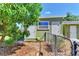 Green workshop with double doors and side door at 797 Michigan Ave, Englewood, FL 34223