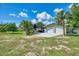 Spacious two-car garage with ample driveway, RV parking at 797 Michigan Ave, Englewood, FL 34223