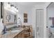 Bathroom with granite vanity and walk-in shower at 504 Pine Hollow Cir # 504, Englewood, FL 34223