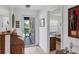 Bright condo entryway with view of balcony and bedroom at 504 Pine Hollow Cir # 504, Englewood, FL 34223