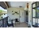 Private balcony with small table and chairs at 504 Pine Hollow Cir # 504, Englewood, FL 34223