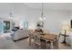 Open dining area with a view of the living room at 504 Pine Hollow Cir # 504, Englewood, FL 34223