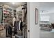 Spacious walk-in closet with ample shelving and hanging space at 504 Pine Hollow Cir # 504, Englewood, FL 34223