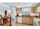 Modern kitchen with granite countertops and ample cabinet space at 504 Pine Hollow Cir # 504, Englewood, FL 34223