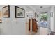 Condo entryway with view into living room and kitchen areas at 504 Pine Hollow Cir # 504, Englewood, FL 34223