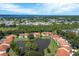 Bird's-eye view of community and surrounding landscape at 504 Pine Hollow Cir # 504, Englewood, FL 34223