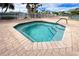 Octagonal spa with brick pavers at 8216 Parkside Dr, Englewood, FL 34224